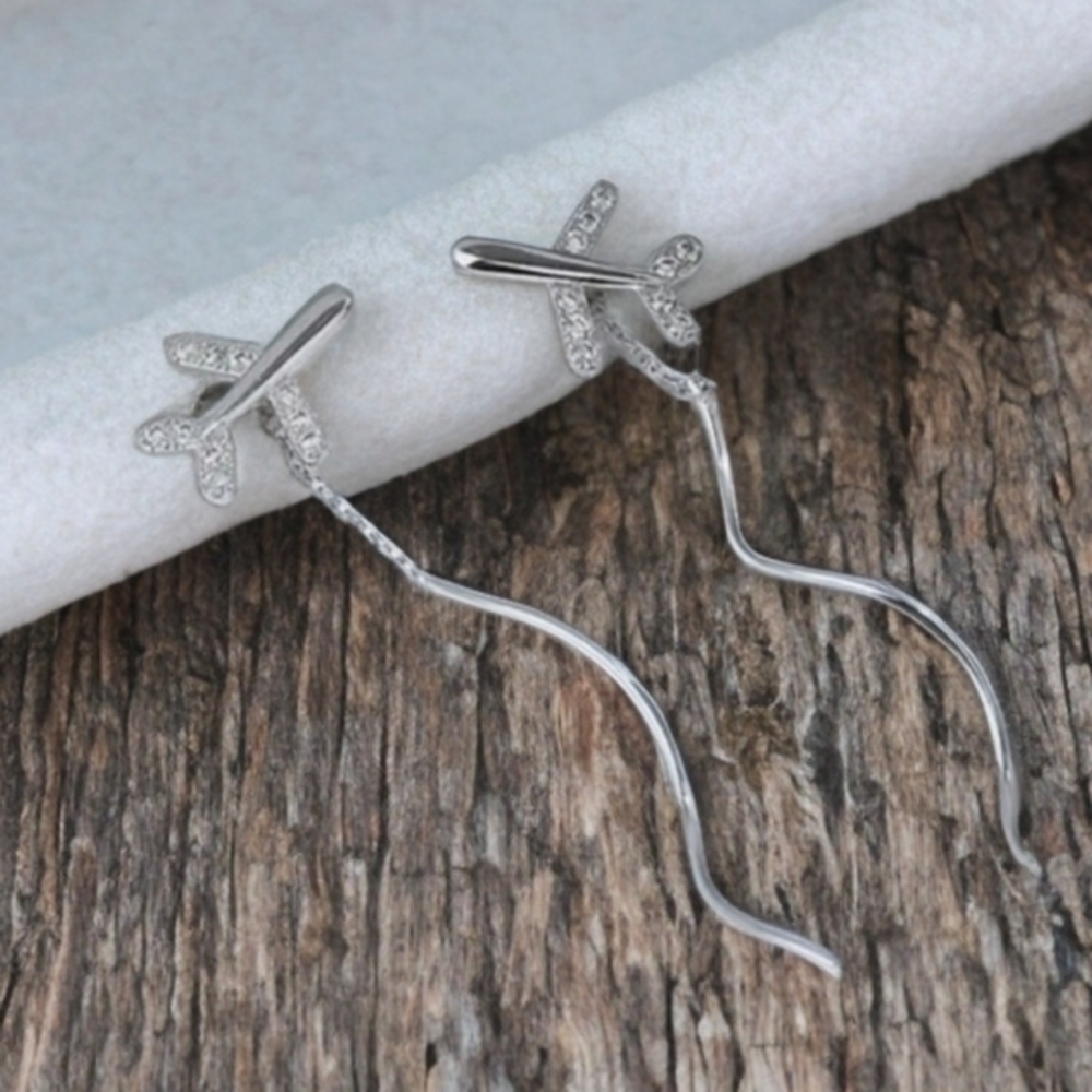 MODCLOTH FLYING AIRPLANE EARRINGS